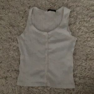 Brandy Melville women’s white button tank.